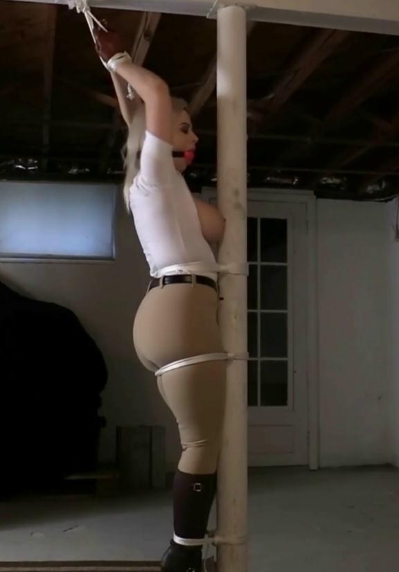 Rope bondage - Sexy Nadia White to be disciplined and taught a lesson. She is trapped, tied in heels and whipped in the basement dungeon