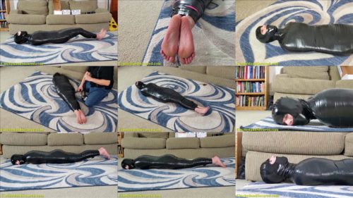 Claire Irons submitted to the tightest mummification - Cocoon of tight wrapping of black tape - Mummification Bondage – A Nice Package!