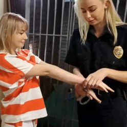 Metal Bondage - Cute prisonteens Ziva and Cara May with leg shackles, metal handcuffs in jumpsuit- Stripper Arresting Part 3