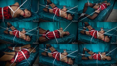 Shinybound Honeydew - Bound ebony goddess with the rope slides back and forth across her satin panties, digging into her crotch and making her so wet - The Crotch Rope Part 1 of 2