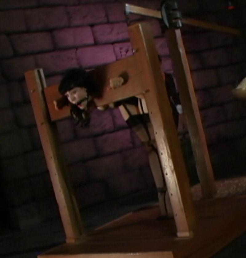 The Adventures of O-girl in to the dungeon in a bondage box – Return of the Black Minx Dr. Rush’s in the Stocks