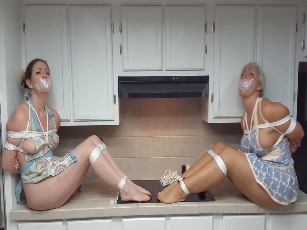 Sandra Silvers and Lisa Harlotte tightly tied in the kitchen with ropes by burglar - Beautiful bare feet bound in pedicured predicament