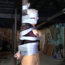 Tape bondage - Adara Jordin is fixinged to a post with tight tape - Things continue to get bad