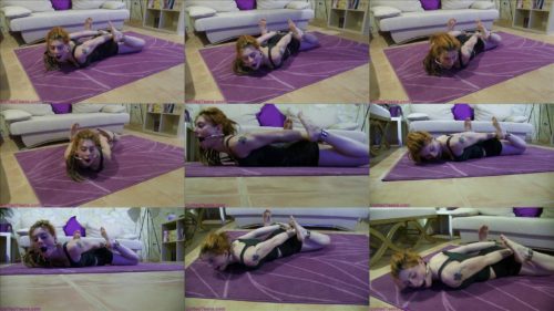 Cuffedteens  - Redhead Muriel is  hogcuffed in steel stocks -  She is in the most difficult position - Metal bondage