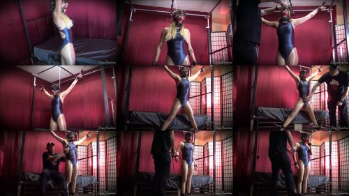 In an awkward position - Shinybound Gypsy Bae is Locked Up - Part 1 of 2 - Gypsy Bae is padlocked tightly into a harness ballgag and chained  - Leather Bondage 