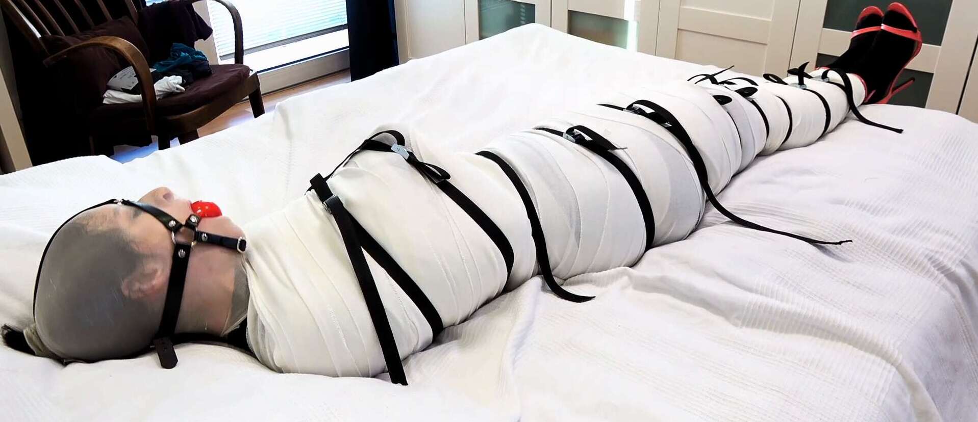 Mummification Bondage - Mummified and restrained in bandages, nylonhooded - Bondish