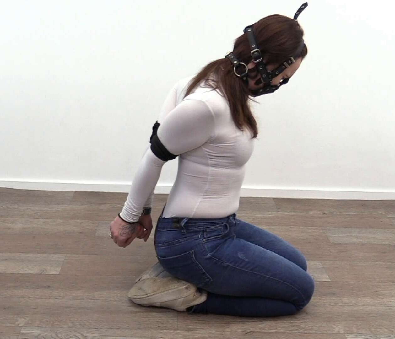 Leather Bondage - Roxy is tight elbow bondage - Boundlife - Roxy trys harness panel gag