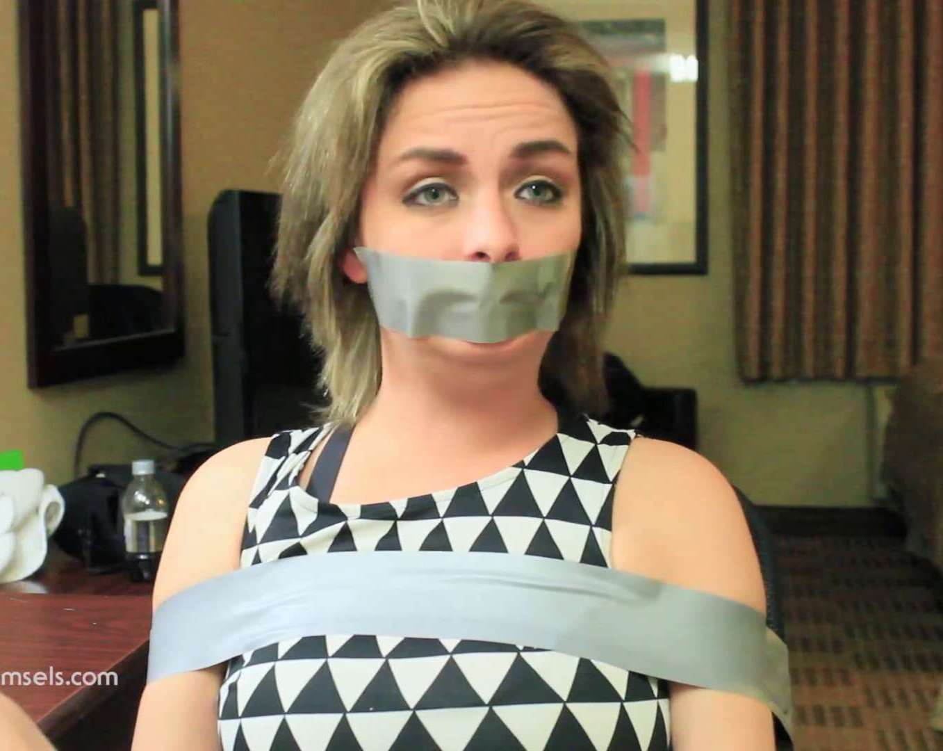 Ashlee Graham is cleave gagged with a thick, white towel - The Ashlee Graham Collection - Tape Bondage