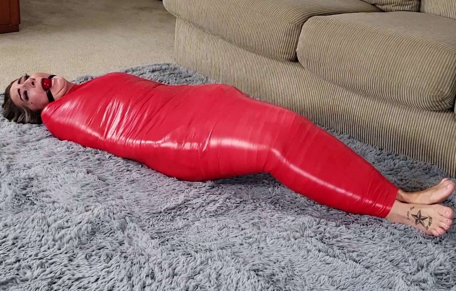 Beautiful fit woman wrapped up tightly - Savannah - Red Mummy Misery - Gag Talk