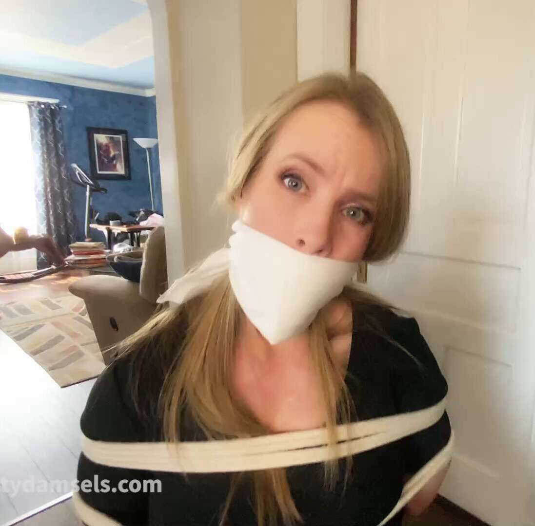Knottydamsels - Claire Irons: Bank Manager Taken - Claire is tied to a chair and OTM gagged
