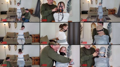Rachel Adams - Gagged and Vanishing Under Tape - Cinched and Secured