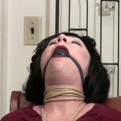 Megan tries to get loose from her chair tie - Rope Bondage